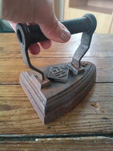 Antique cast iron sad - antique,