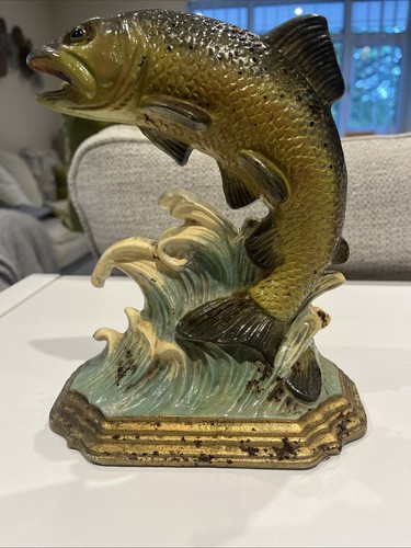 Vintage cast iron leaping